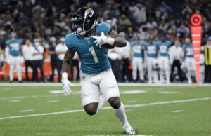 Who is Travis Etienne’s handcuff (And are they worth stashing)? Travis Etienne’s handcuff